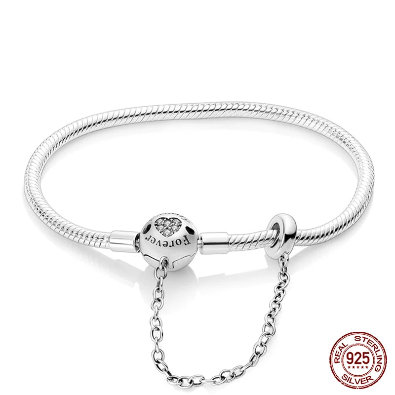 925 sterling zilveren bedelarmband – Ster, maan, zon & klavertje vier met groene zirconia