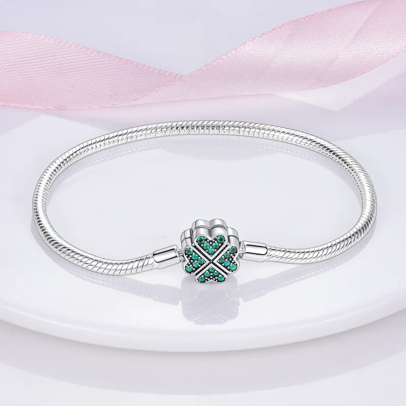 925 sterling zilveren bedelarmband – Ster, maan, zon & klavertje vier met groene zirconia