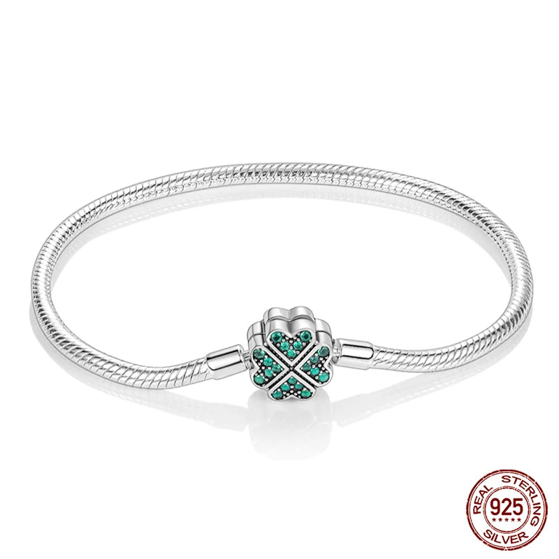 925 sterling zilveren bedelarmband – Ster, maan, zon & klavertje vier met groene zirconia