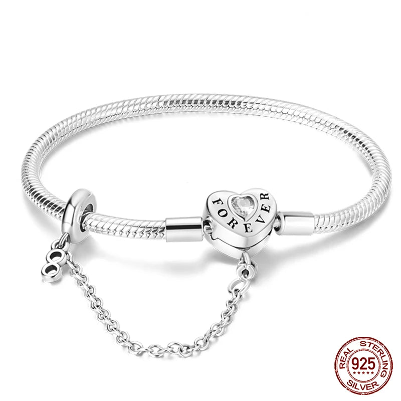 925 sterling zilveren bedelarmband – Ster, maan, zon & klavertje vier met groene zirconia